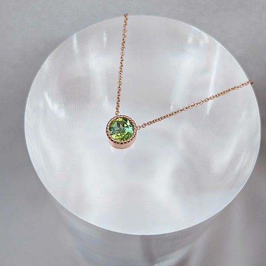 Lime green bicolour tourmaline from the Mille collection