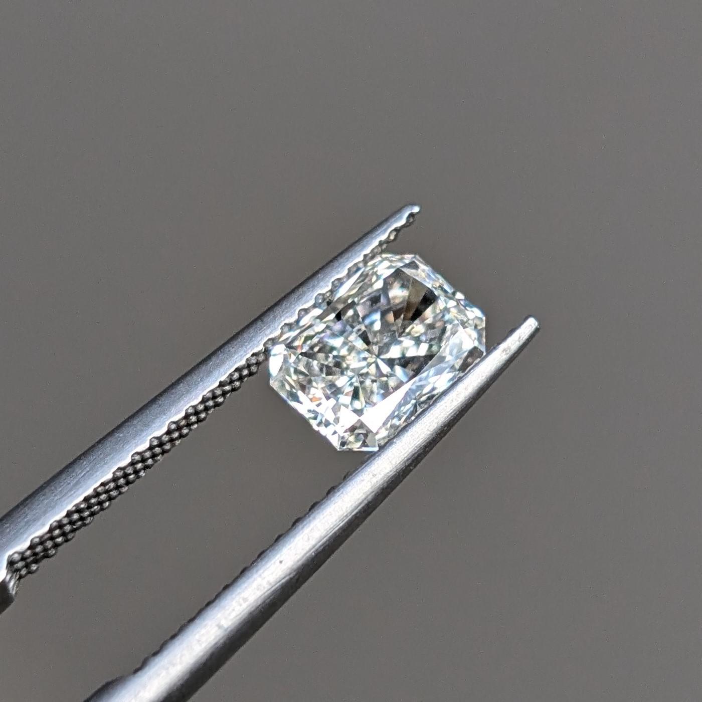 Close-up of radiant diamond showing sparkling reflections under light
