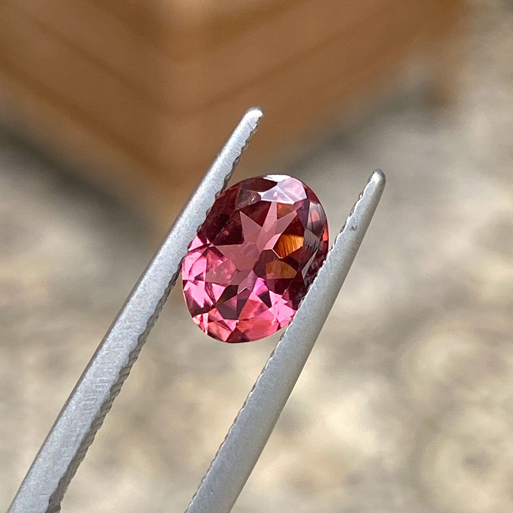 Orange and pink oval cut tourmaline for custom ring