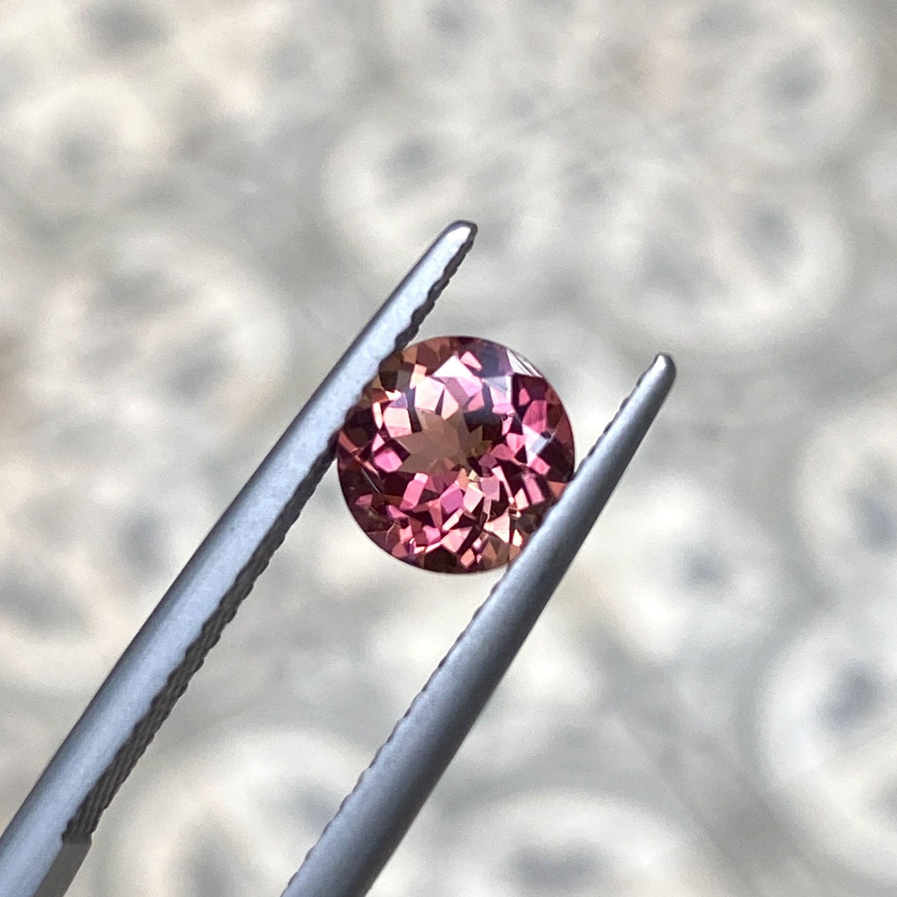 Pink peach bicolour round tourmaline gemstone