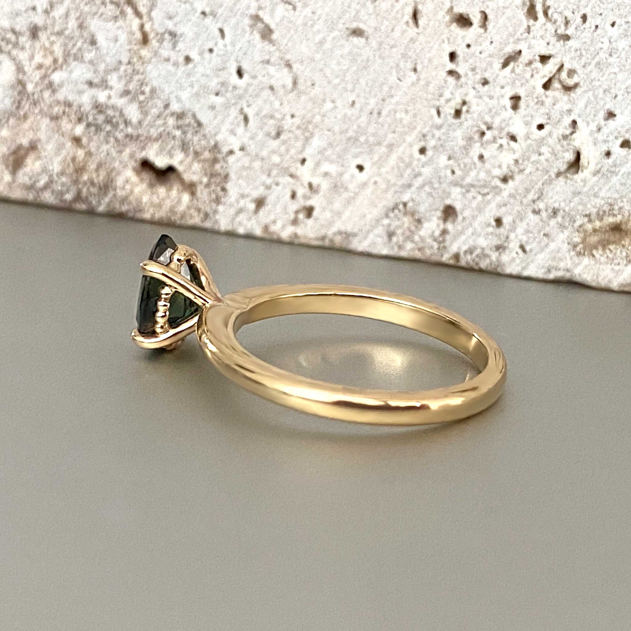 Pear solitaire engagement ring with Australian sapphire