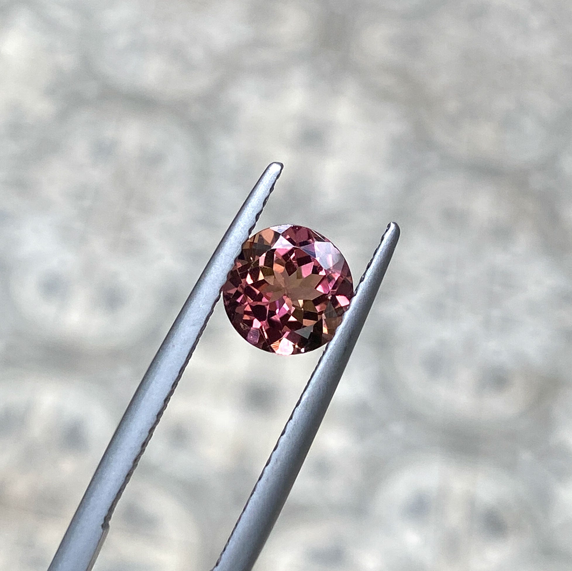 Round bicolour tourmaline for unique ring designs