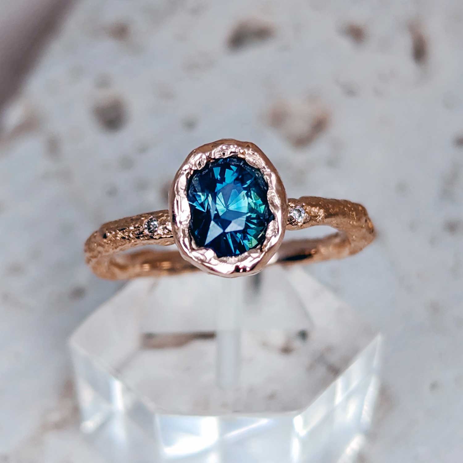 Unique engagement rings Sydney with teal sapphire by Sydney ring designer Fairina Cheng