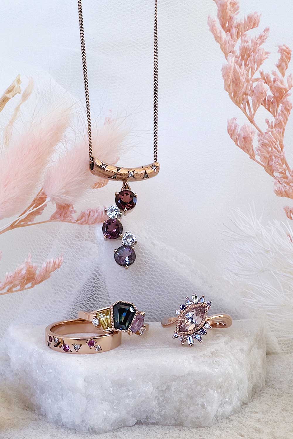 Custom designed jewellery, rings and necklaces in sapphire, tourmaline, diamond and rose gold