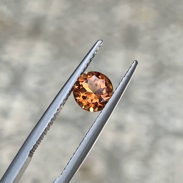 Round cut orange tourmaline for custom ring designs