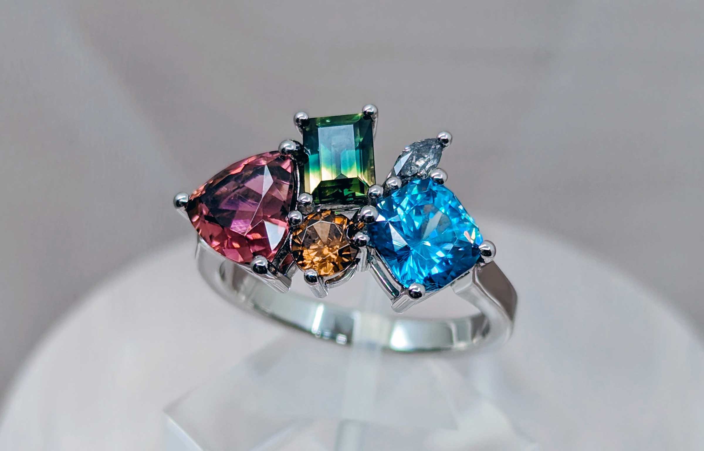 Sapphire, zircon and salt and pepper diamond platinum cluster ring