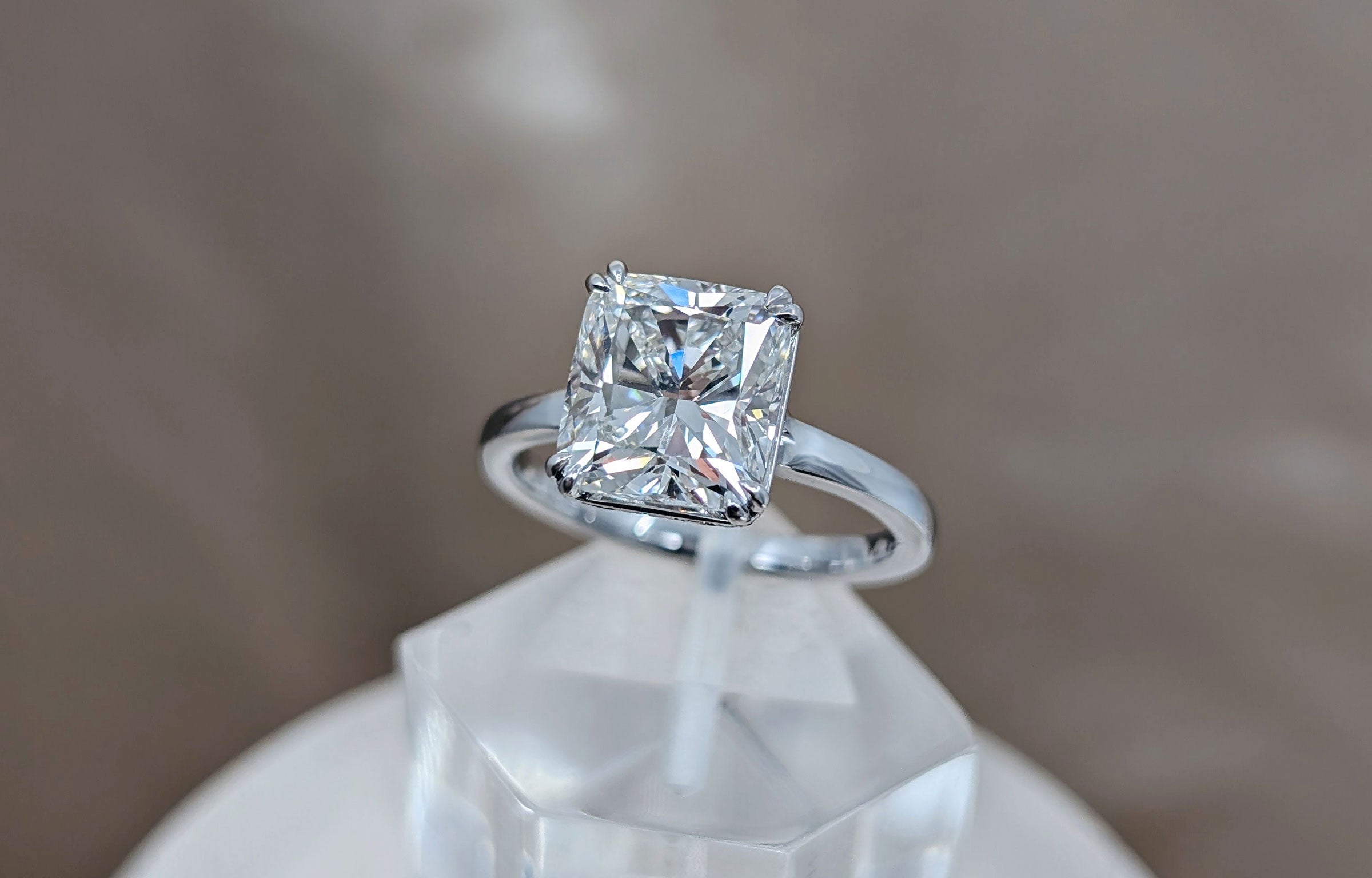 Radiant cut hidden halo engagement ring