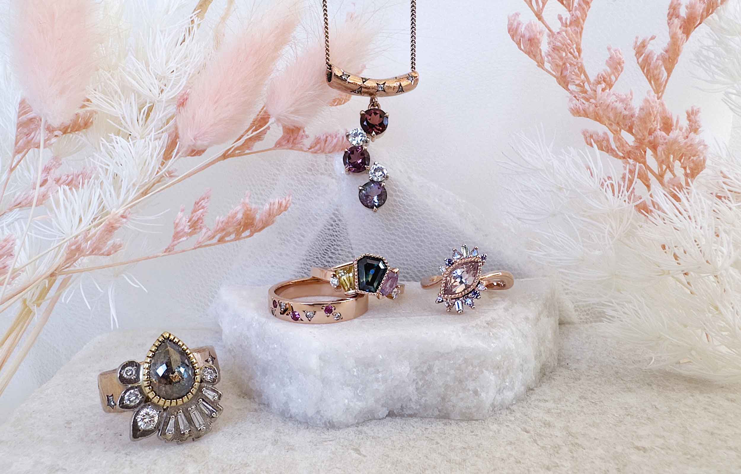 Untraditional white gold, yellow gold, rose gold pieces in tourmalines, sapphires and diamonds