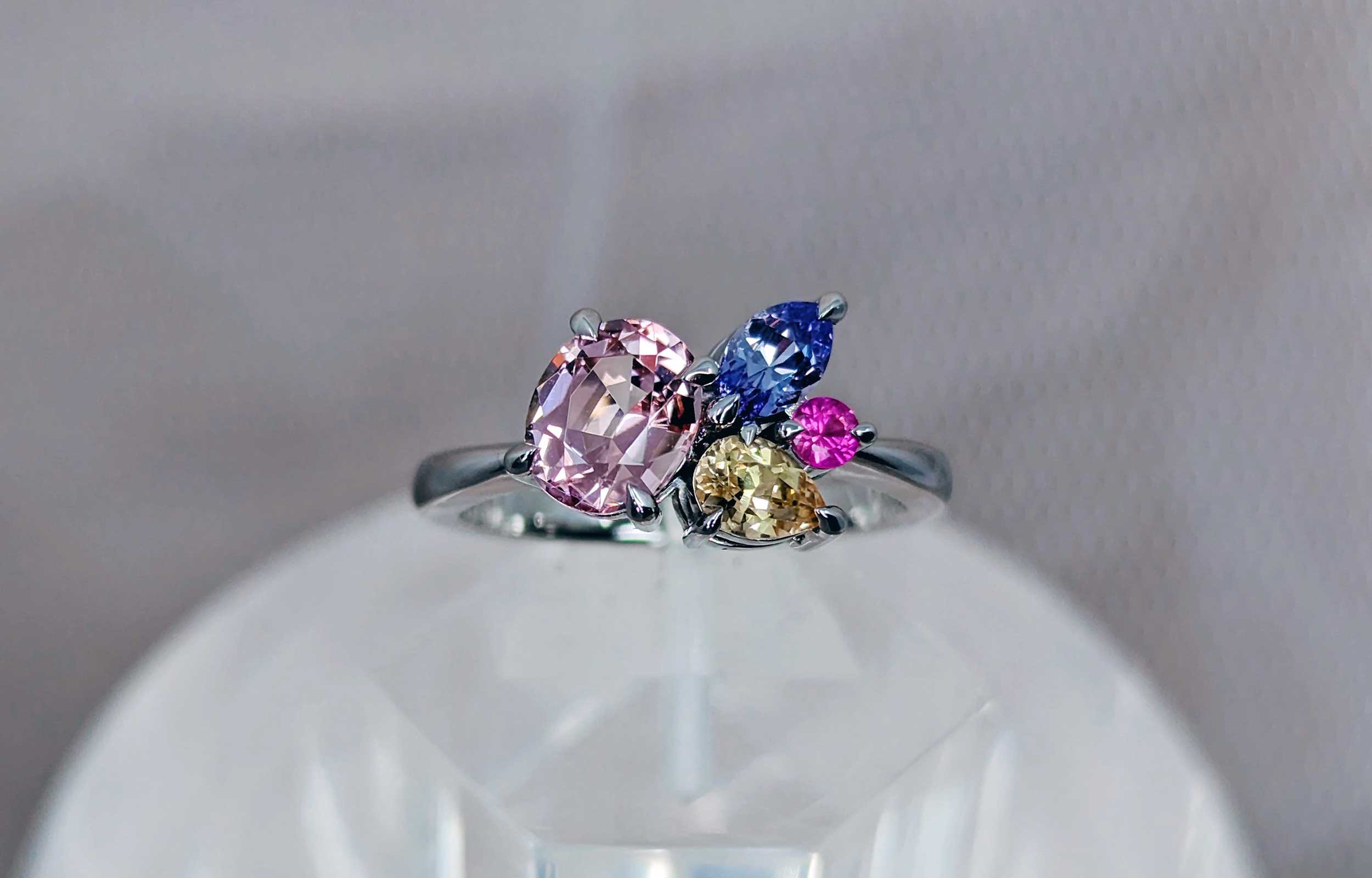 Pink tourmaline and sapphire cluster ring in platinum