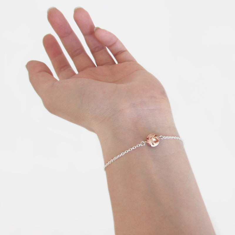 3D printed rose gold bracelet worn