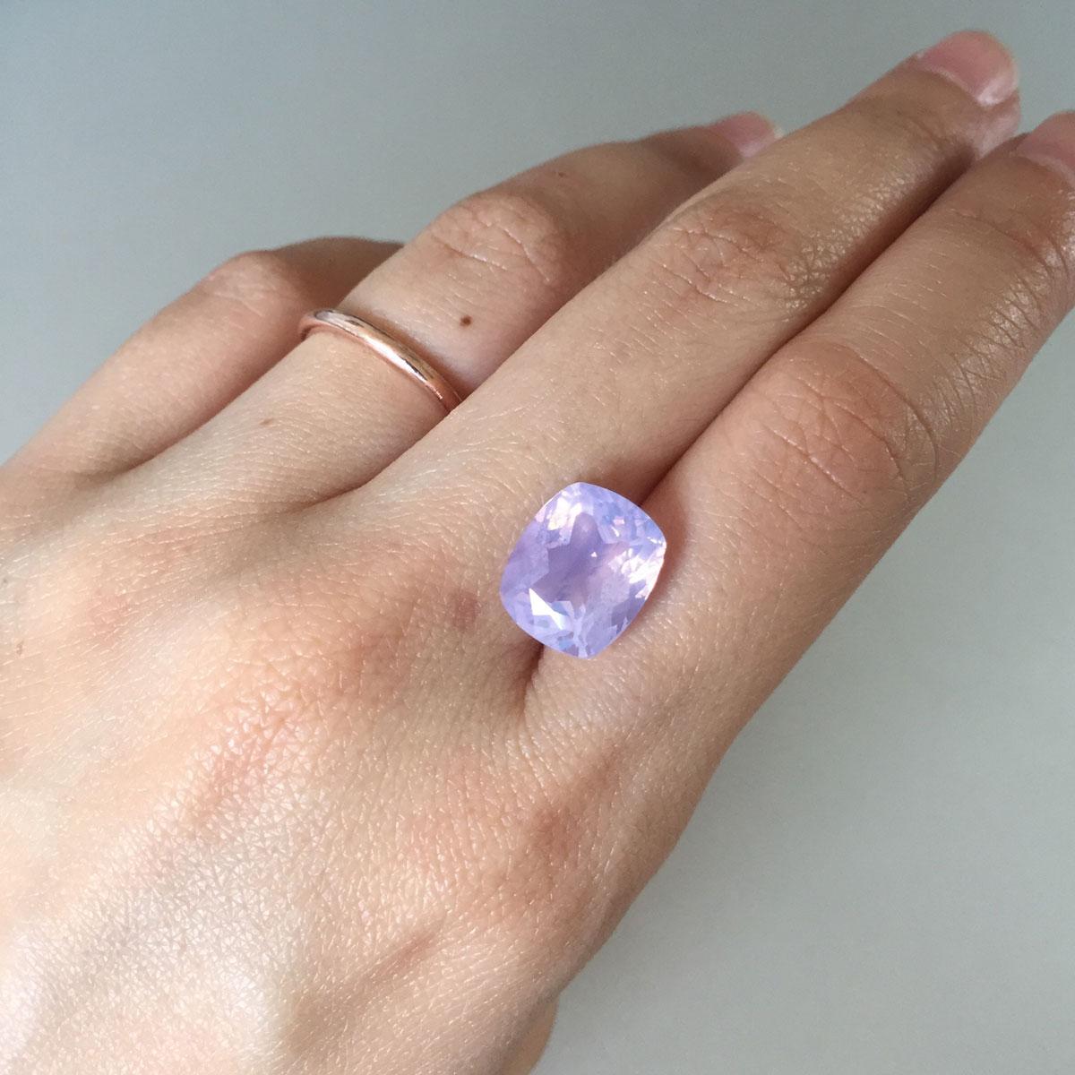 Cushion cut lavender quartz on hand