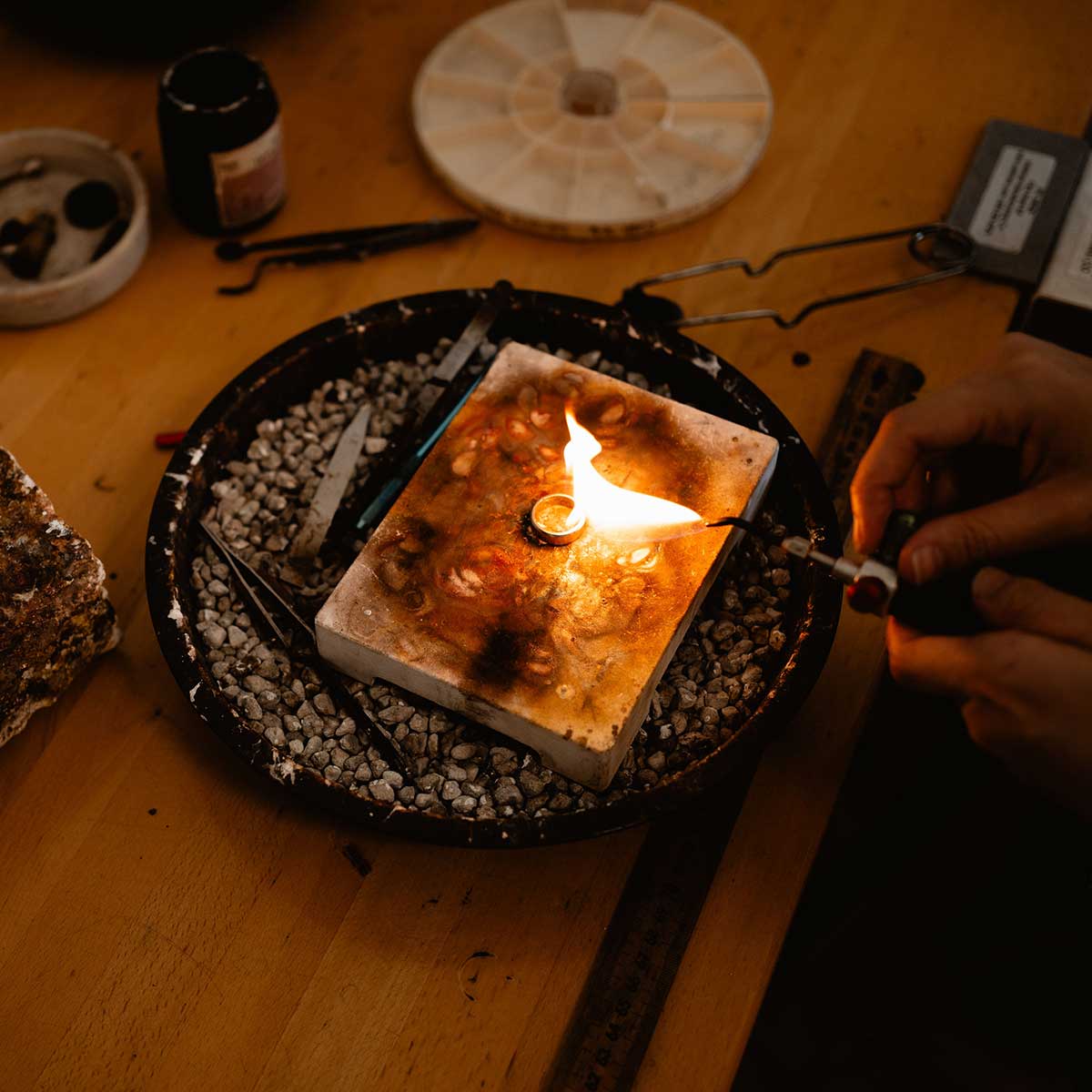 Soldering a ring, photographed by Tess Lehman