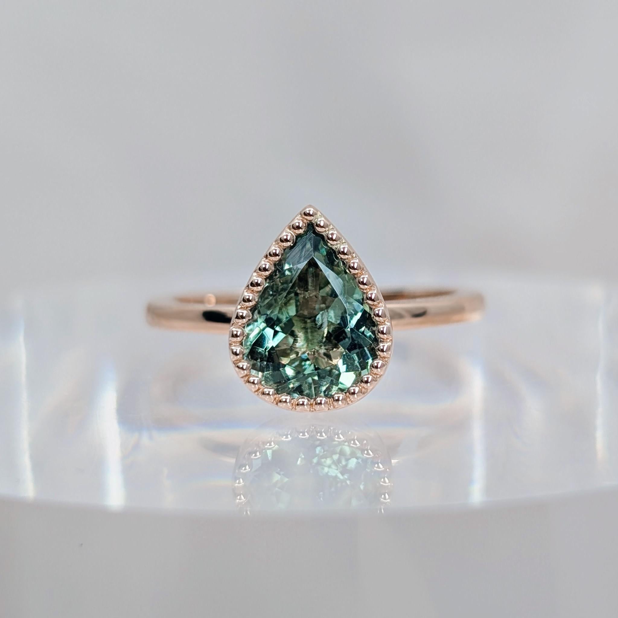 Pear Green tourmaline milgrain ring front