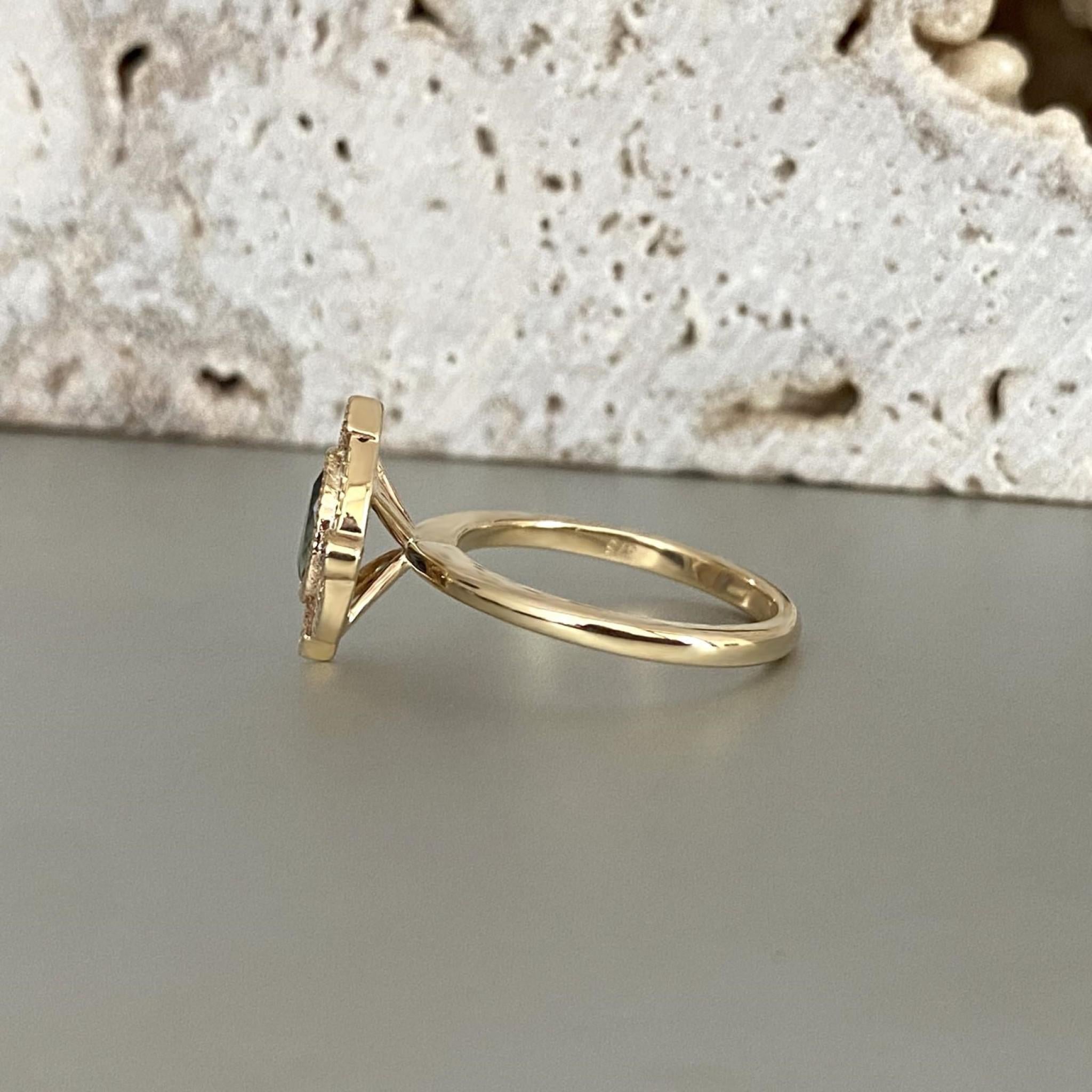 Halo engagement ring side view