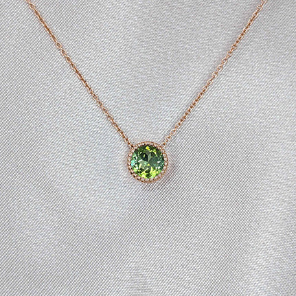 Bright green tourmaline solitaire necklace in rose gold, made by Fairina Cheng