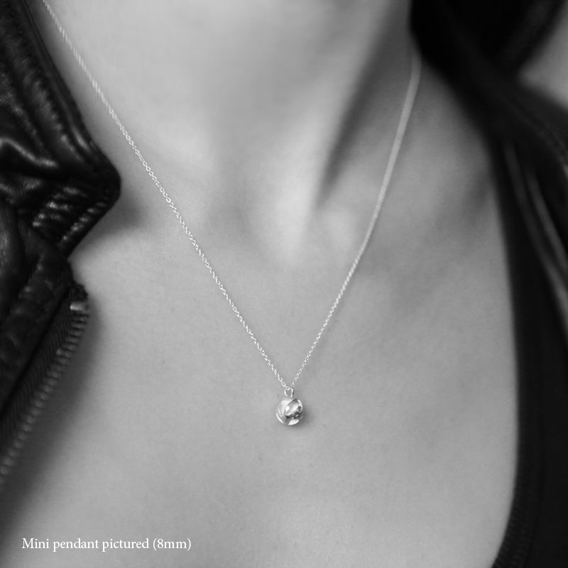 silver 3D printed geometric pendant necklace worn