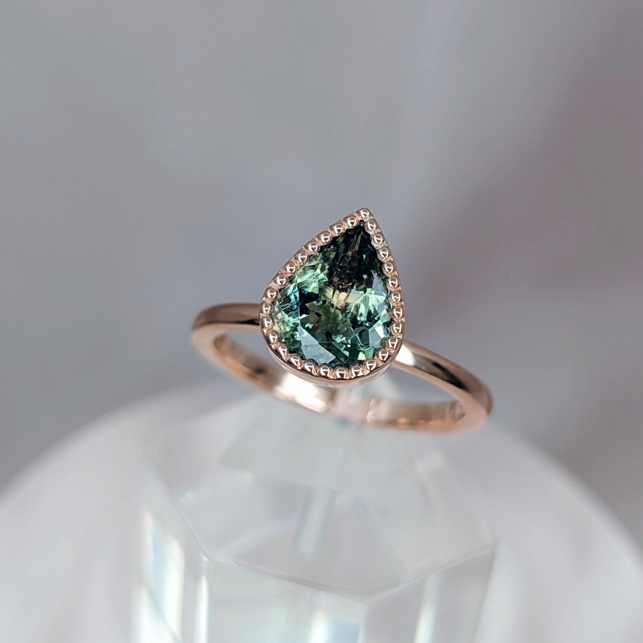 Pear green tourmaline milgrain ring