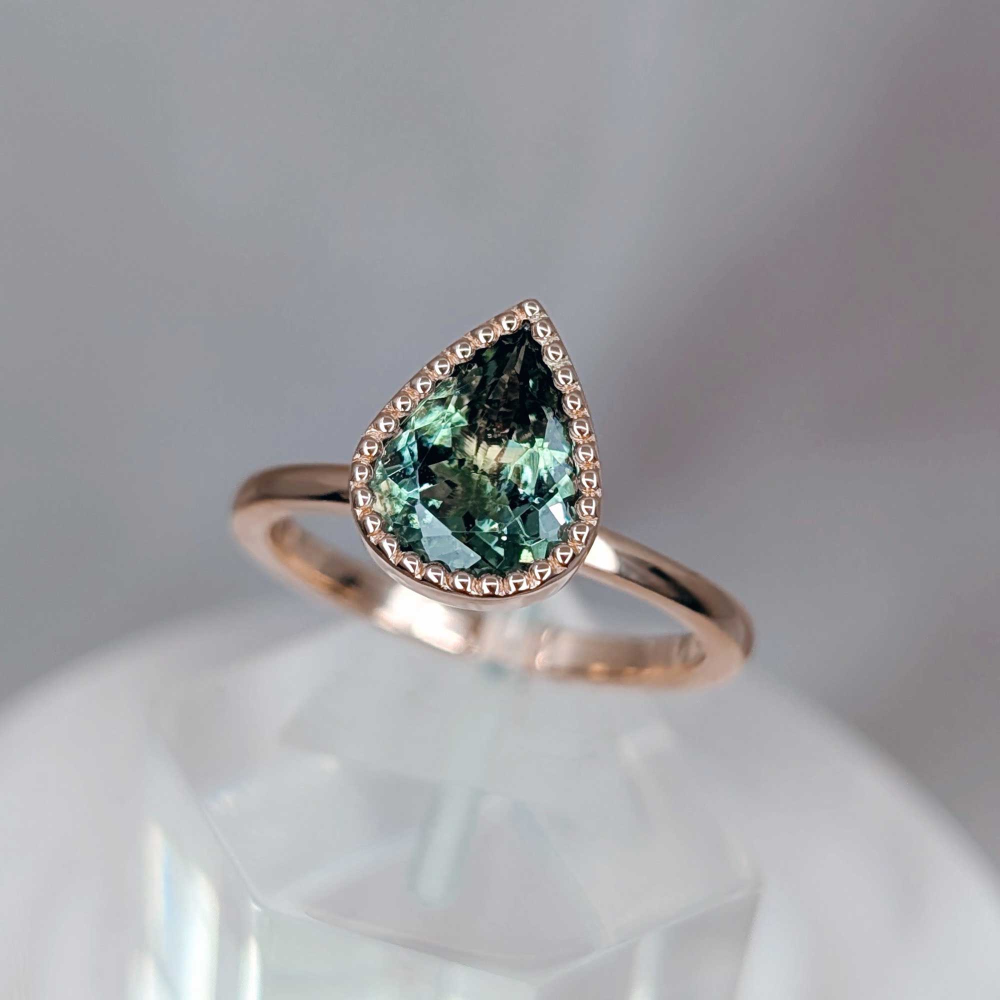 Pear green tourmaline milgrain ring by independent jeweller, Sydney designer Fairina Cheng