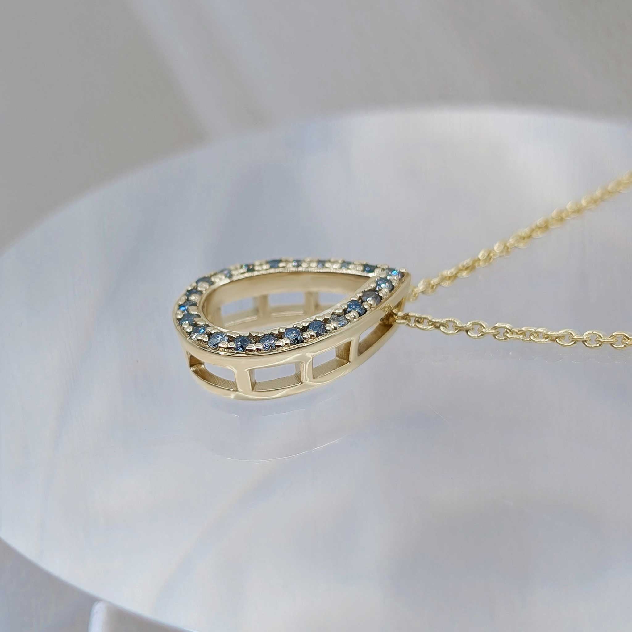 Pear diamond necklace with salt and pepper diamonds