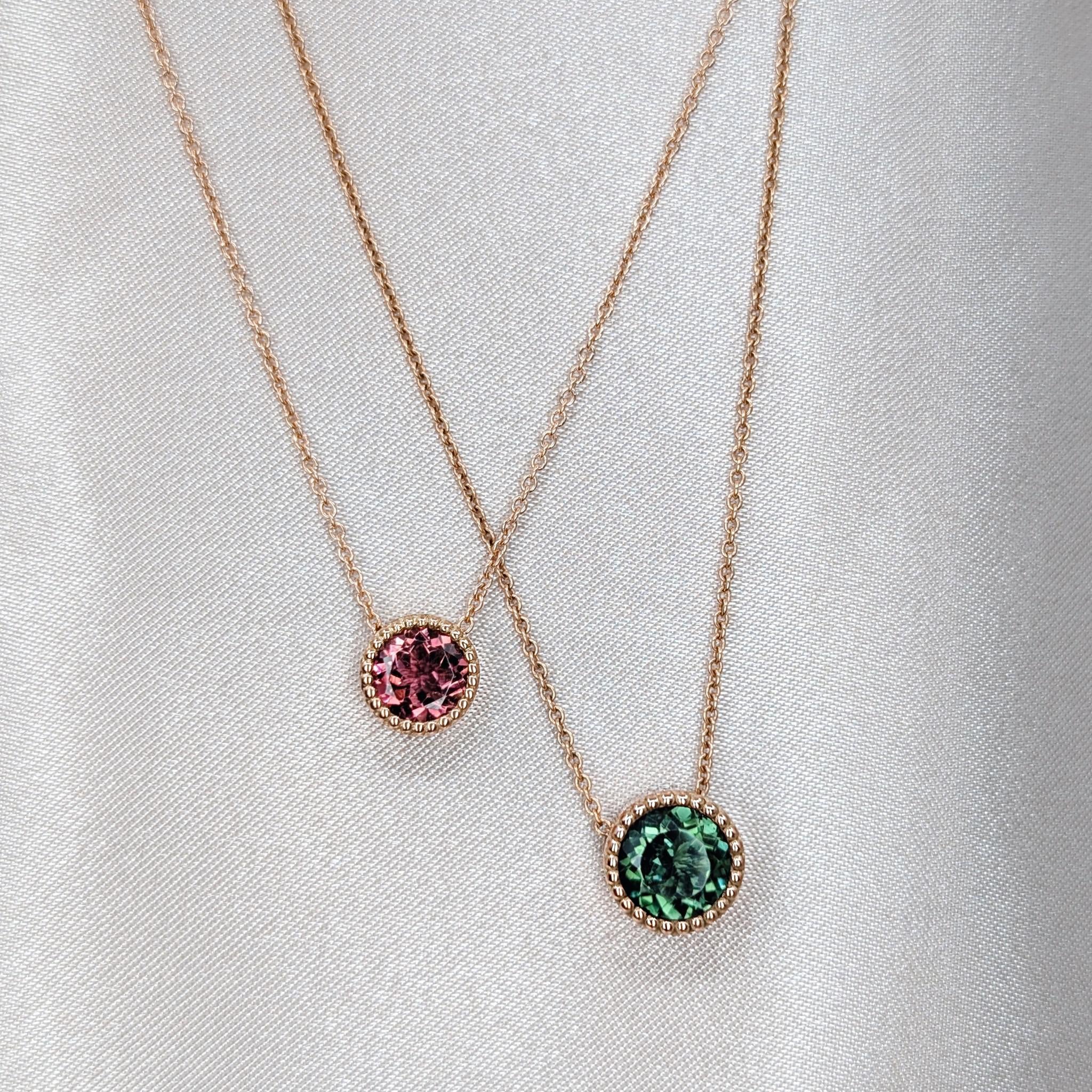 gold necklaces with green and pink tourmalines
