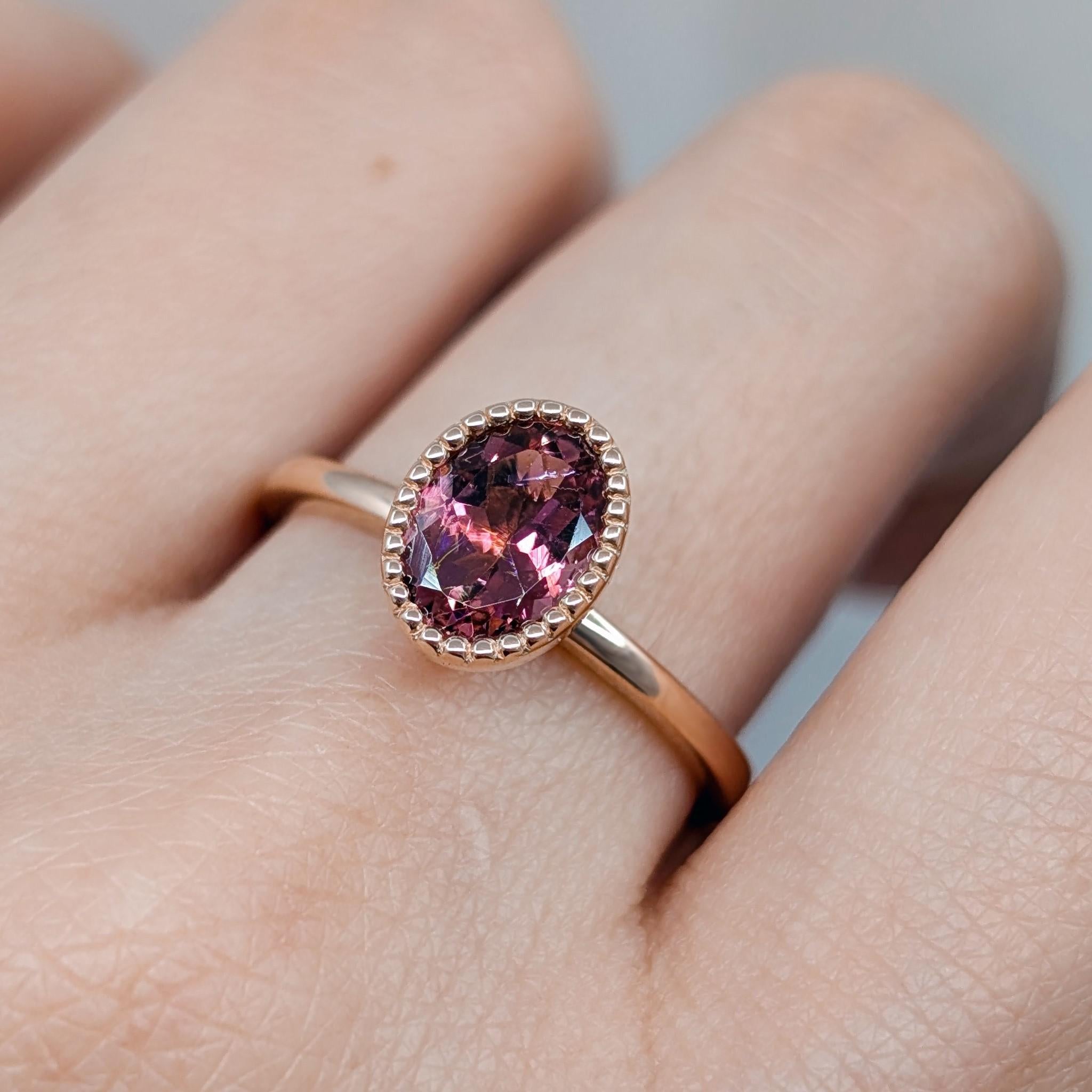 pink tourmaline milgrain ring on hand