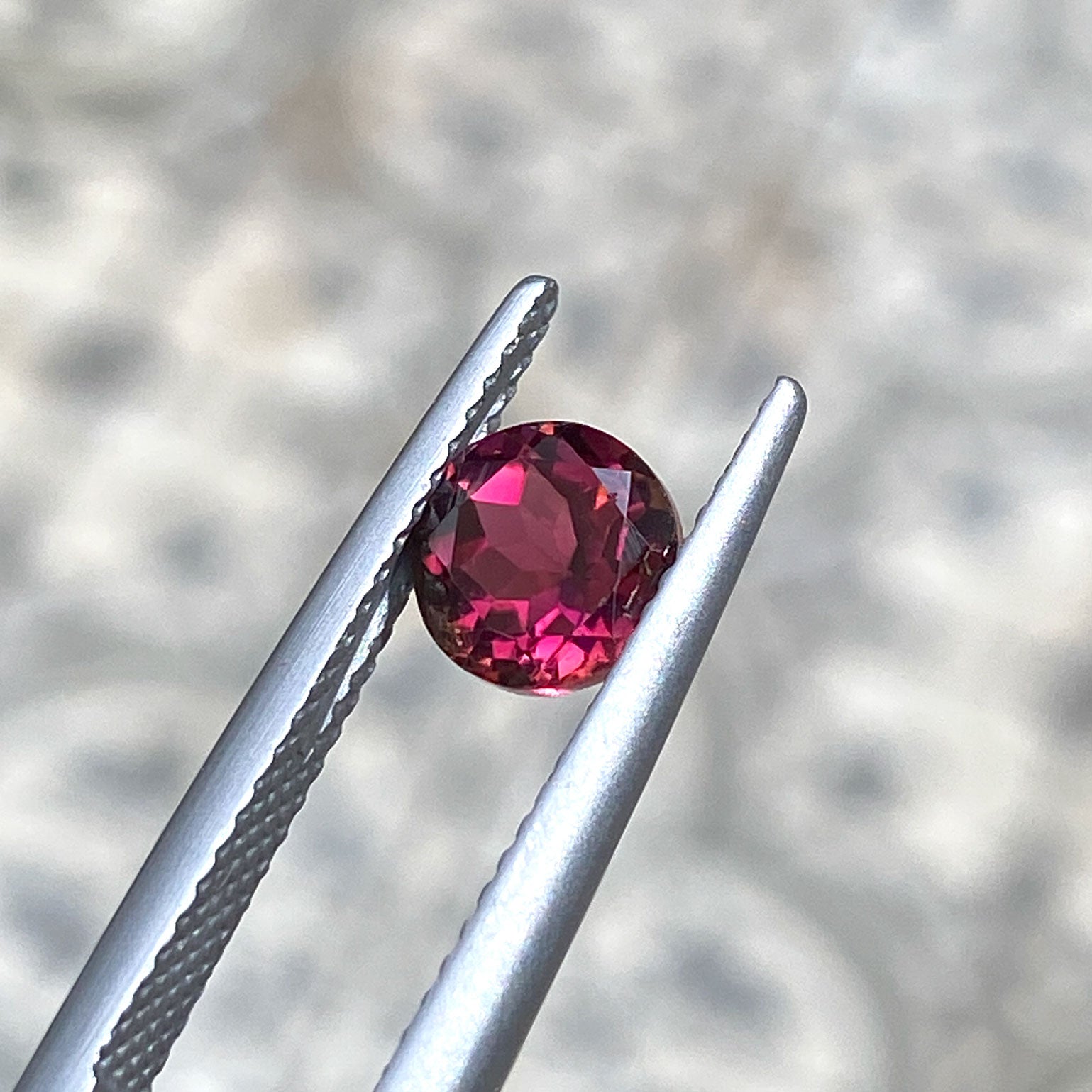 Red pink orange round tourmaline