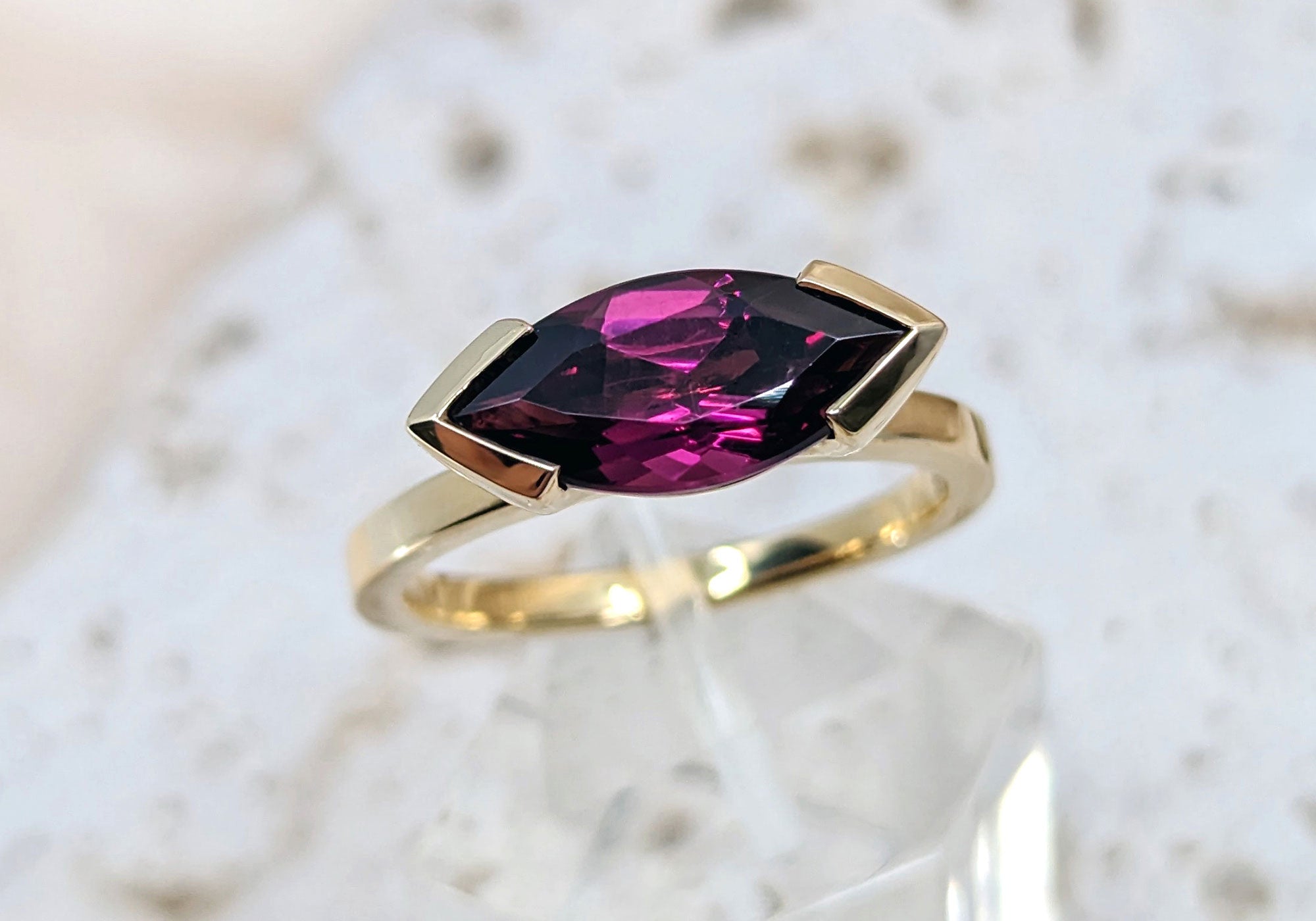 Rhodolite garnet marquis ring in yellow gold