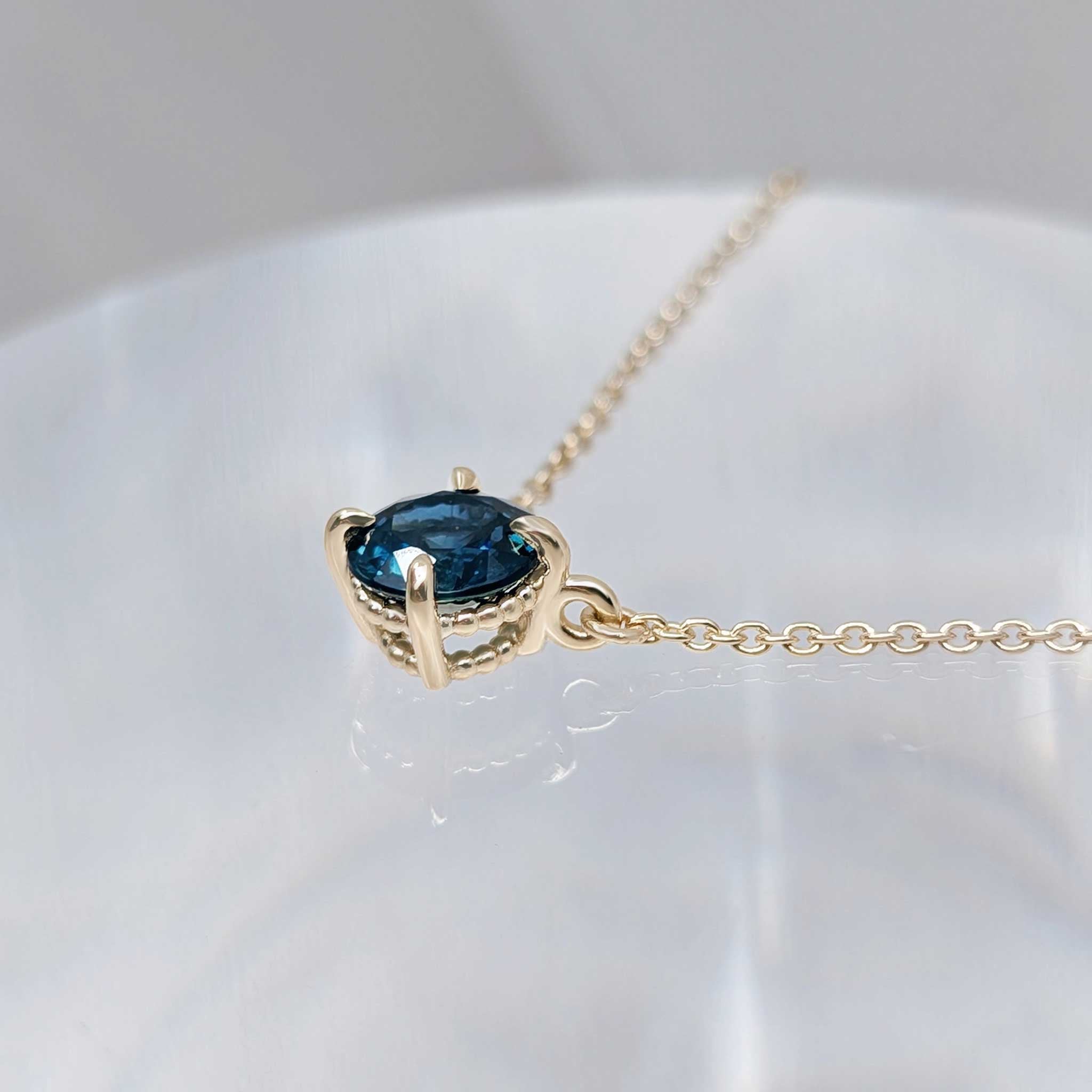 Round sapphire solitaire necklace