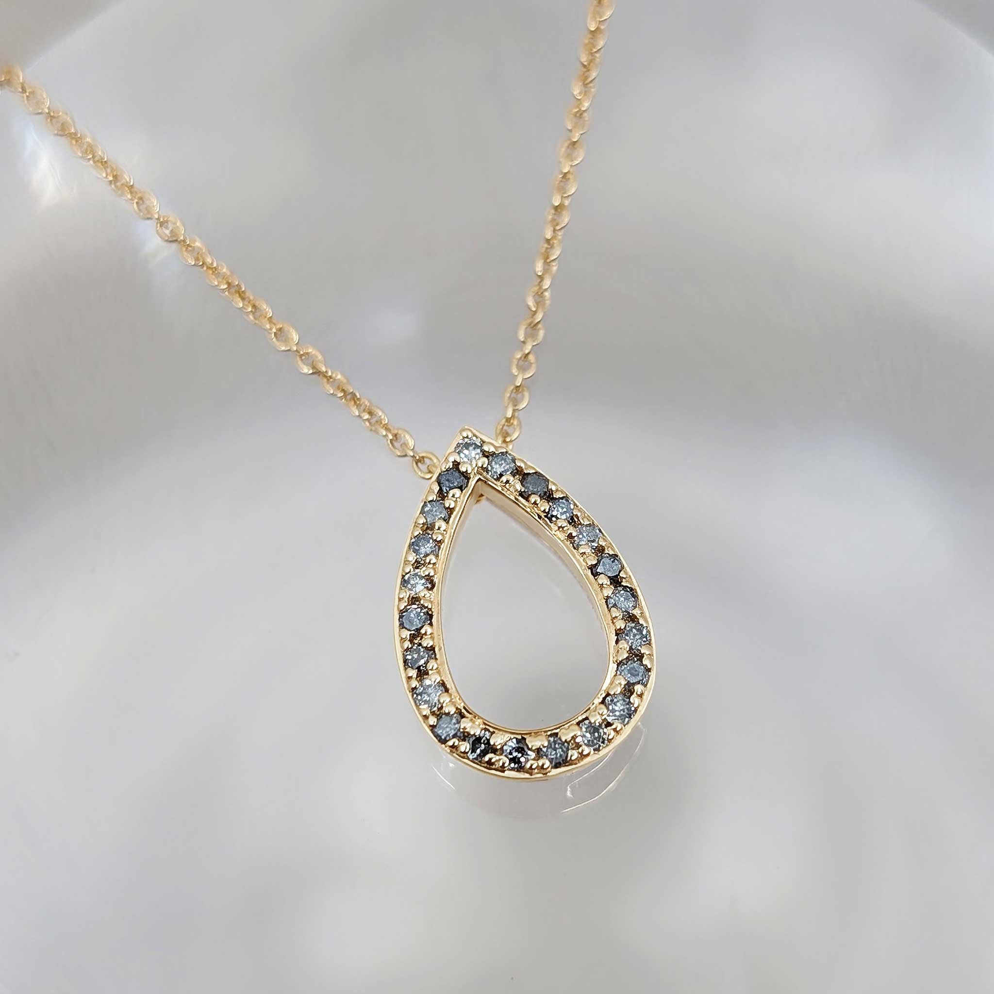 Salt and pepper diamond pendant in yellow gold