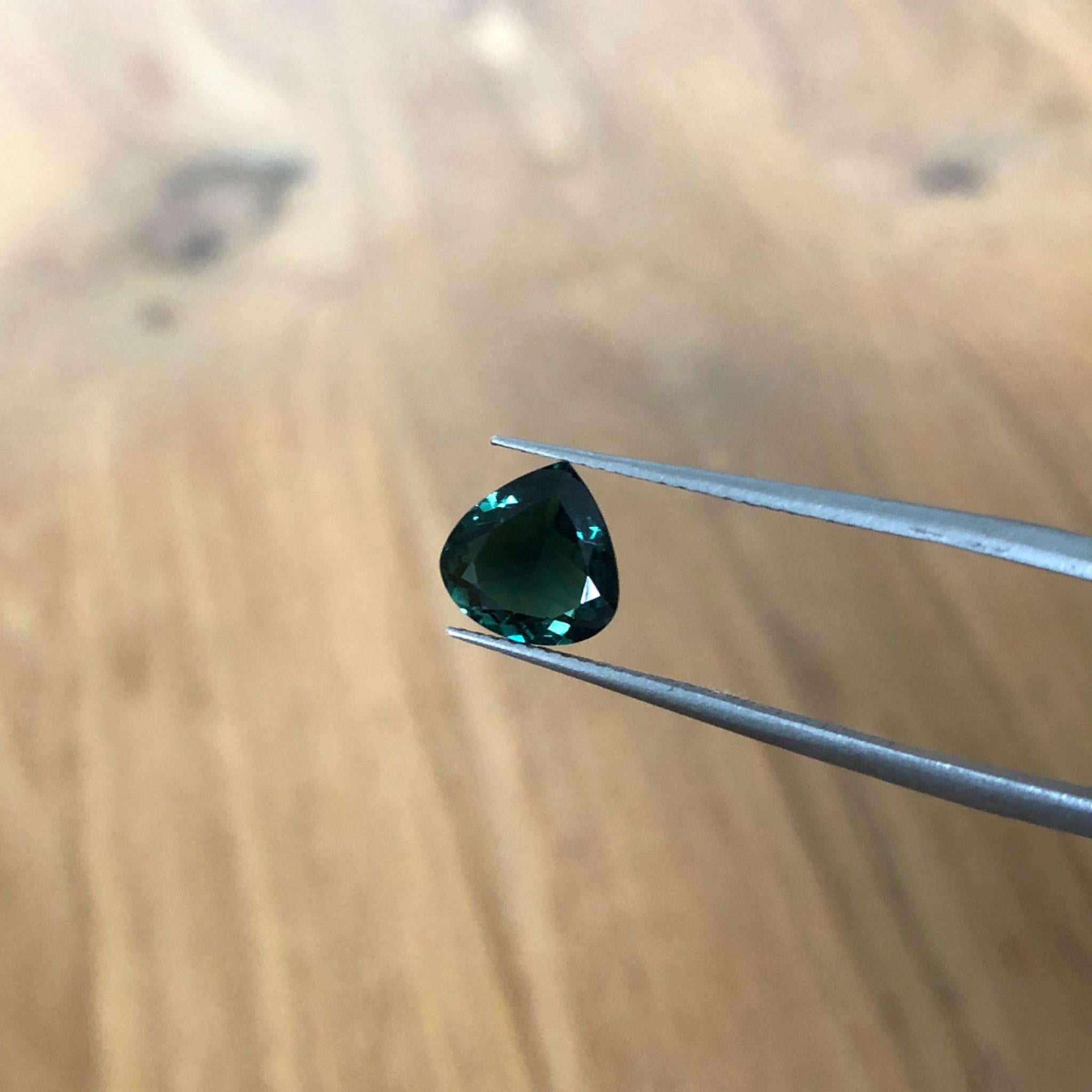 Secret garden green tourmaline gem