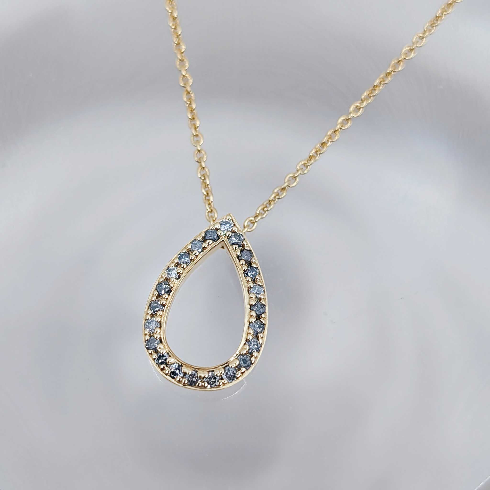 Teardrop salt and pepper diamond pendant