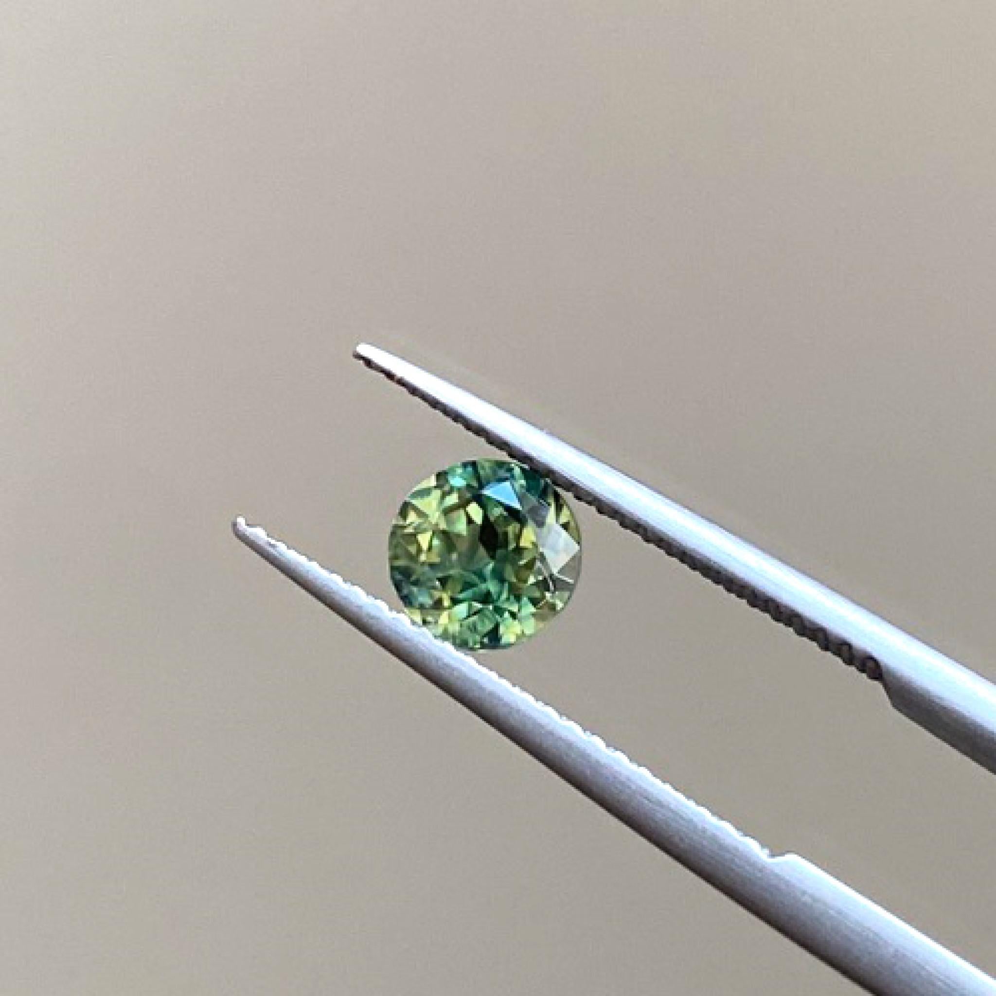 Yellow green Australian parti sapphire gemstone