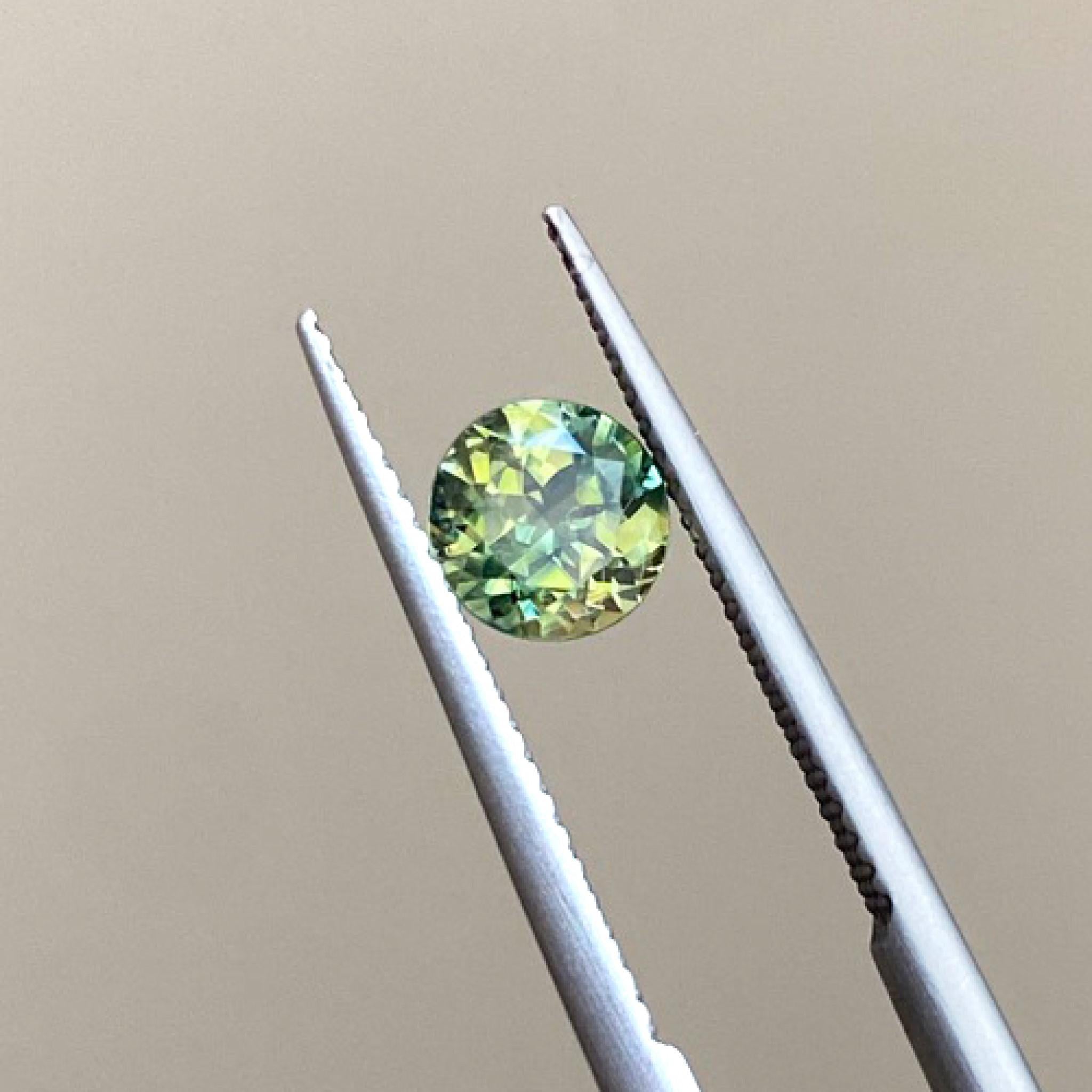 Yellow green Australian parti sapphire round cut