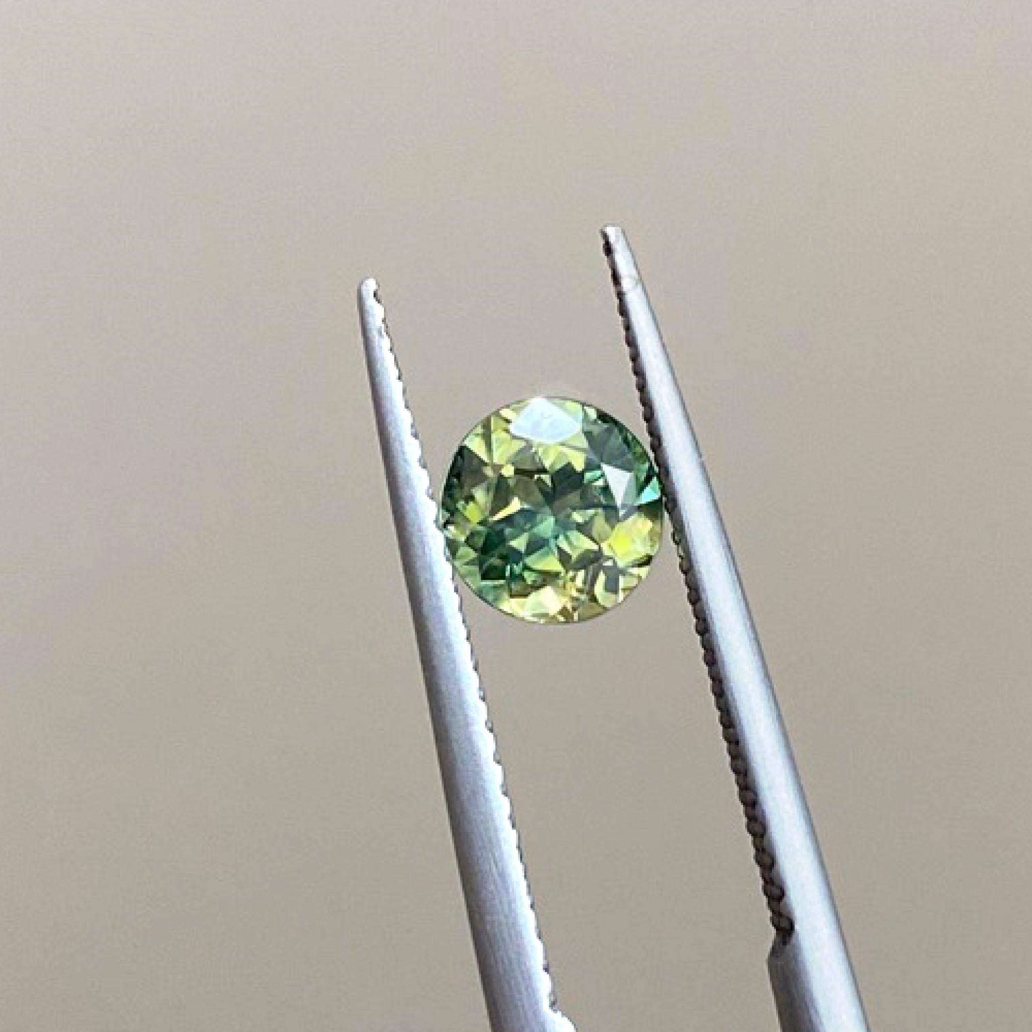 Yellow green Australian parti sapphire round