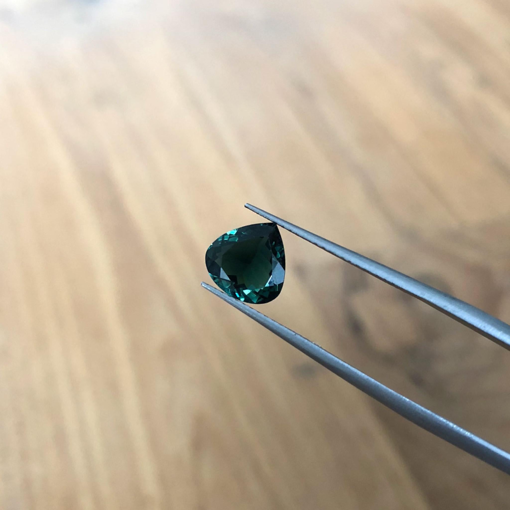 Secret garden green tourmaline displayed