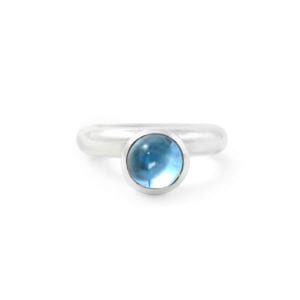Blue topaz cabochon ring in sterling silver