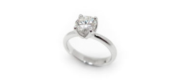 Custom made solitaire diamond engagement ring