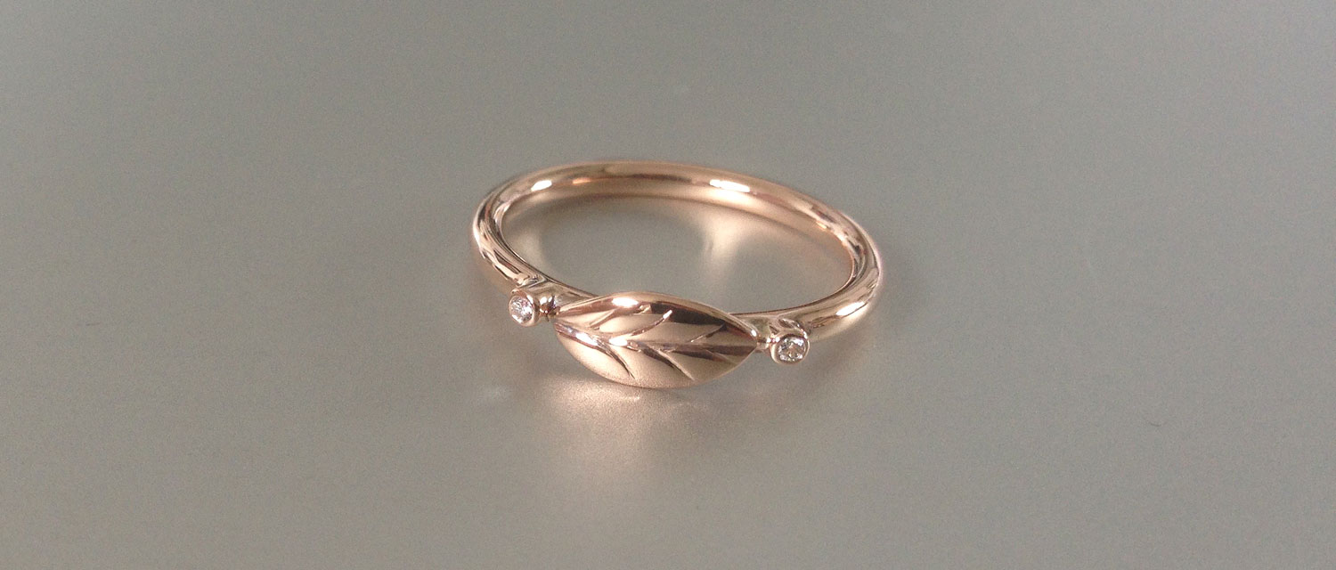 Rose gold leaf promise ring with diamonds