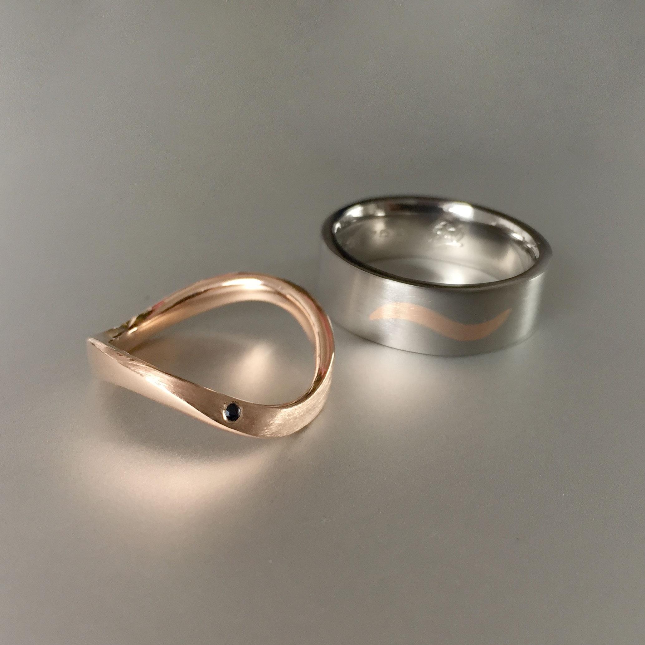 Rose gold and titanium wedding rings