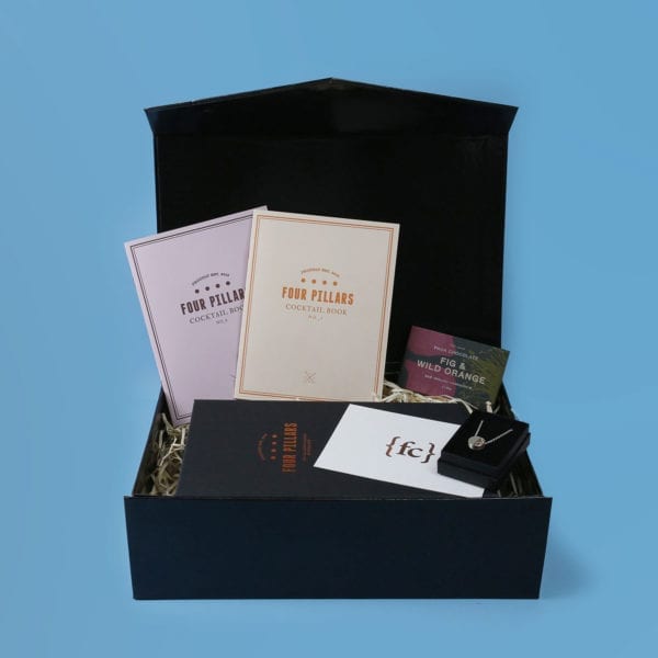 Fruit and Flowers fourth year anniversary gift set with Four Pillars Rare Dry Gin and a silver and rose gold necklace
