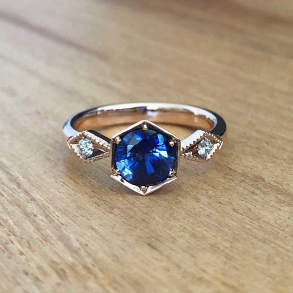 Rose gold, blue sapphire and white diamond vintage engagement ring