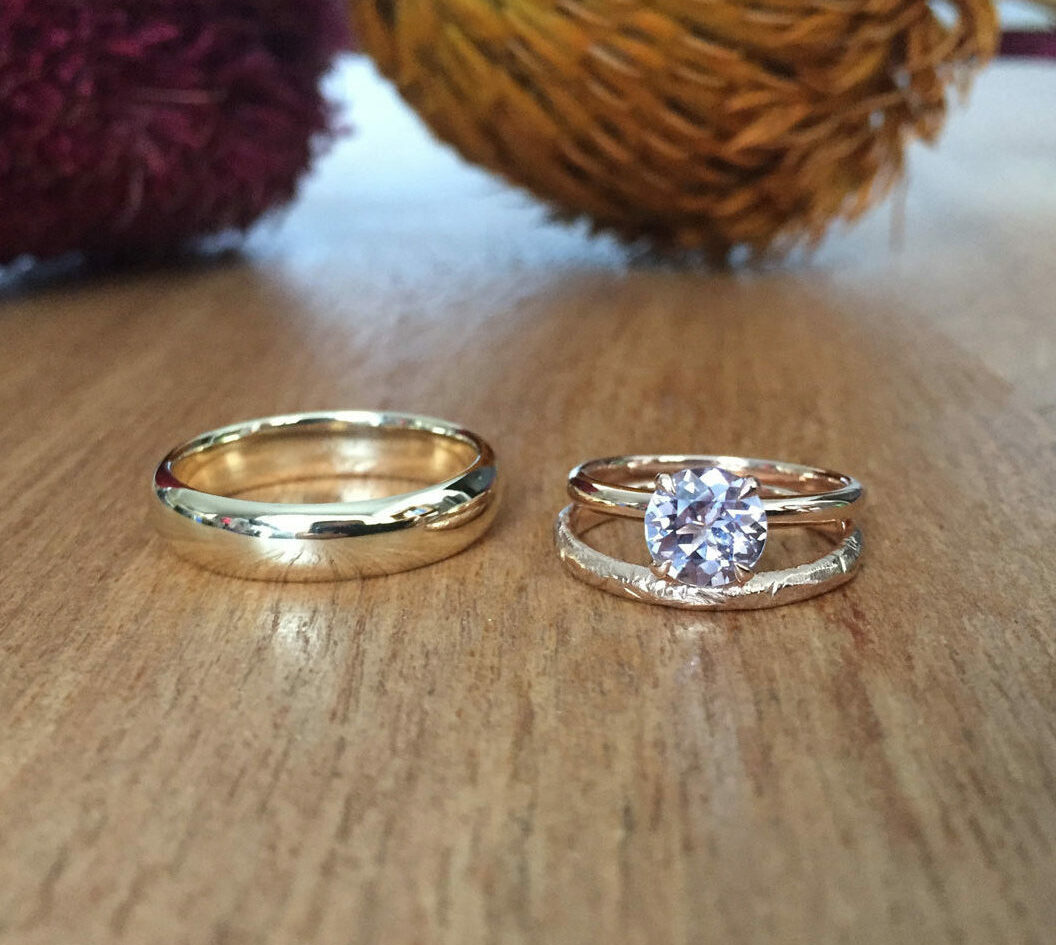Alternative engagement rings - Pink sapphire and rose gold engagement ring with a yellow gold wedding band