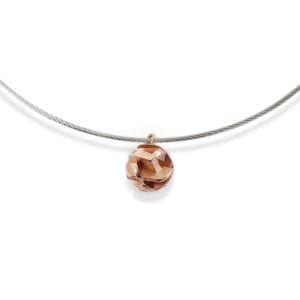 Rose gold choker necklace on stainless steel cable