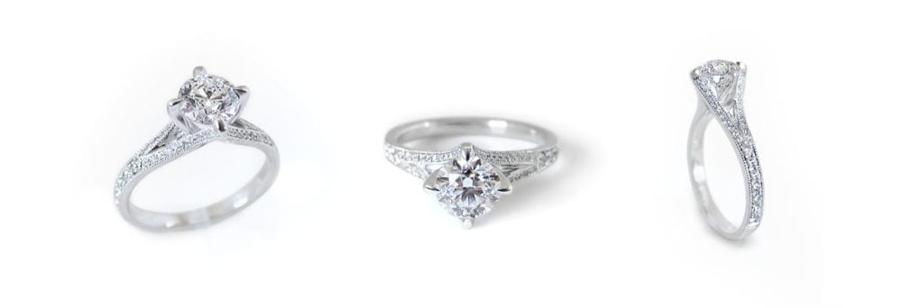 Unique white gold and solitaire diamond engagement ring custom made with a split ring band