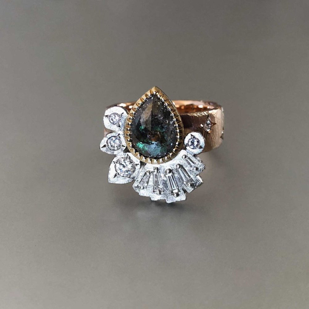 Rose gold, white gold, yellow gold salt and pepper diamond heirloom ring with star-set diamonds and an emerald
