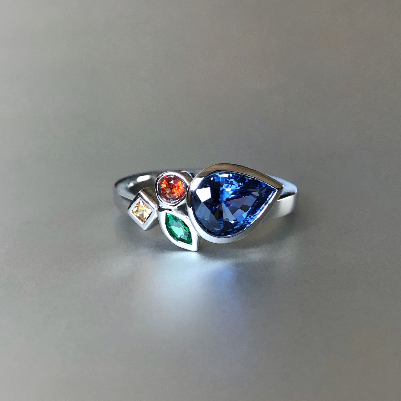Sapphire-tsavorite-cluster-ring