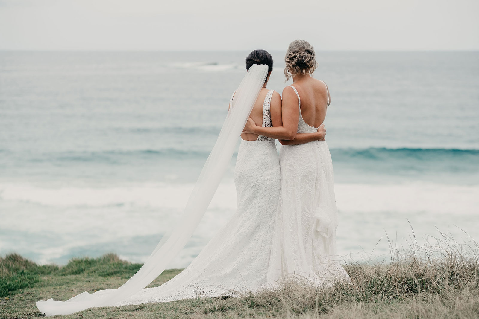 Courtney and Sheridynn by the sea wedding photo