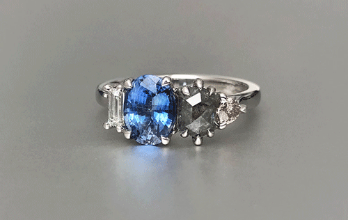 Sapphire, salt and pepper diamond, champagne diamond and baguette diamond platinum coral ring