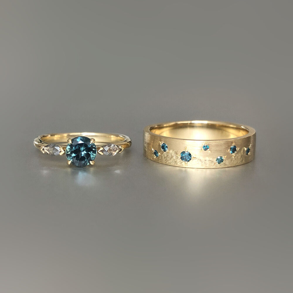 Australian parti sapphire, salt and pepper diamond and treated teal diamond engagement and wedding ring set