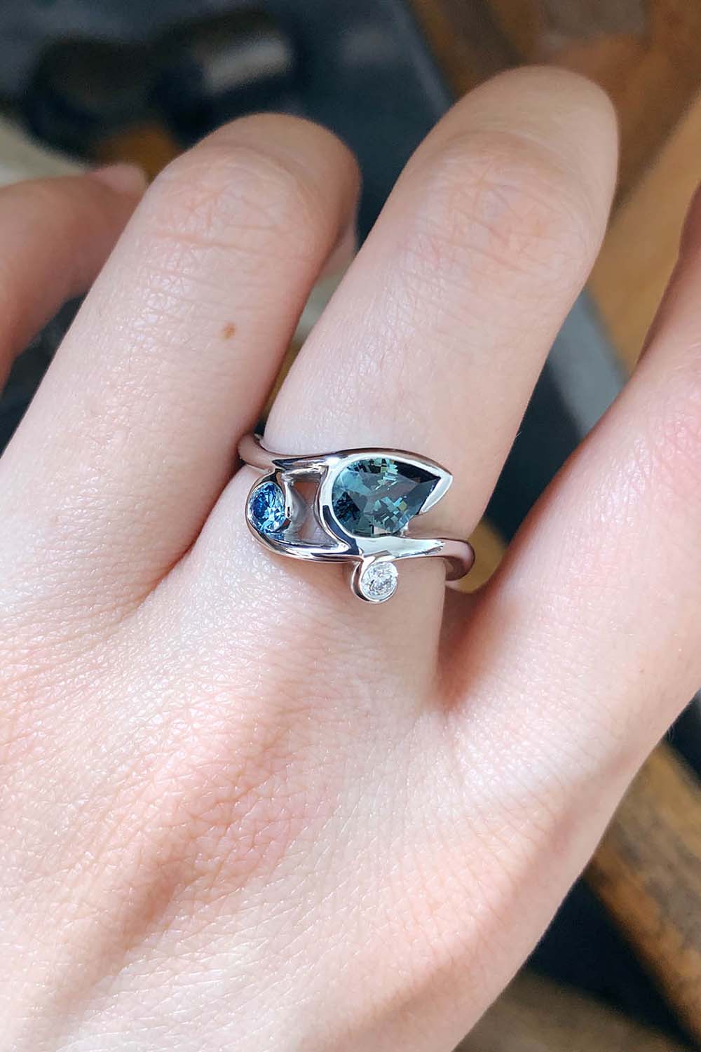 Platinum, Australian sapphire, treated blue diamond and white diamond ring
